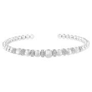 Bids.com .925 Sterling Silver 1/4 Cttw Diamond Rondelle Graduated Ball Bead Cuff Bangle Bracelet (I-J color, I2-I3 clarity) - Fits wrists up to 7 1/2 inches Bracelets