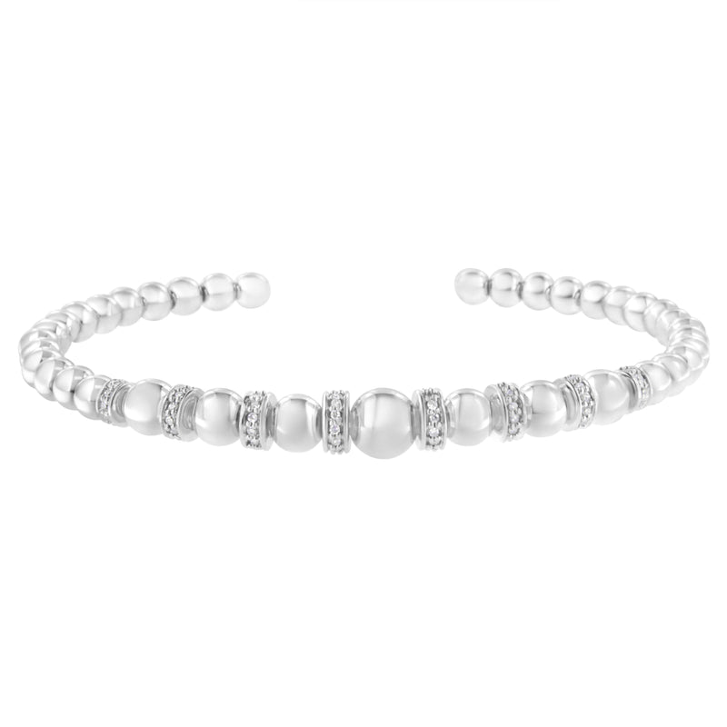 Bids.com .925 Sterling Silver 1/4 Cttw Diamond Rondelle Graduated Ball Bead Cuff Bangle Bracelet (I-J color, I2-I3 clarity) - Fits wrists up to 7 1/2 inches Bracelets