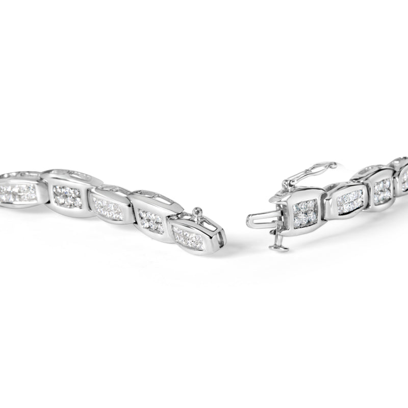 Bids.com 14K White Gold 2-1/2 Cttw Round-Brilliant & Baguette Cut Diamond 7" Alternating Flared Links Tennis Bracelet (H-I Color, SI1-SI2 Clarity) Bracelets