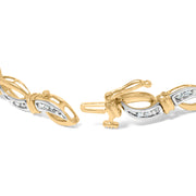 Bids.com 10K Yellow and White Gold 1/2 Cttw Channel Set Diamond Infinity Link 7" Tennis Bracelet (H-I Color, I1-I2 Clarity) Bracelets