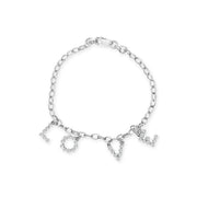 Bids.com 10k White Gold 1/6 Cttw Diamond "Love" Charm Cable Chain Bracelet (H-I Color, I1-I2 Clarity) - 7" Bracelets