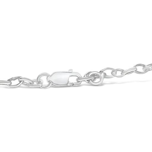 Bids.com 10k White Gold 1/6 Cttw Diamond "Love" Charm Cable Chain Bracelet (H-I Color, I1-I2 Clarity) - 7" Bracelets