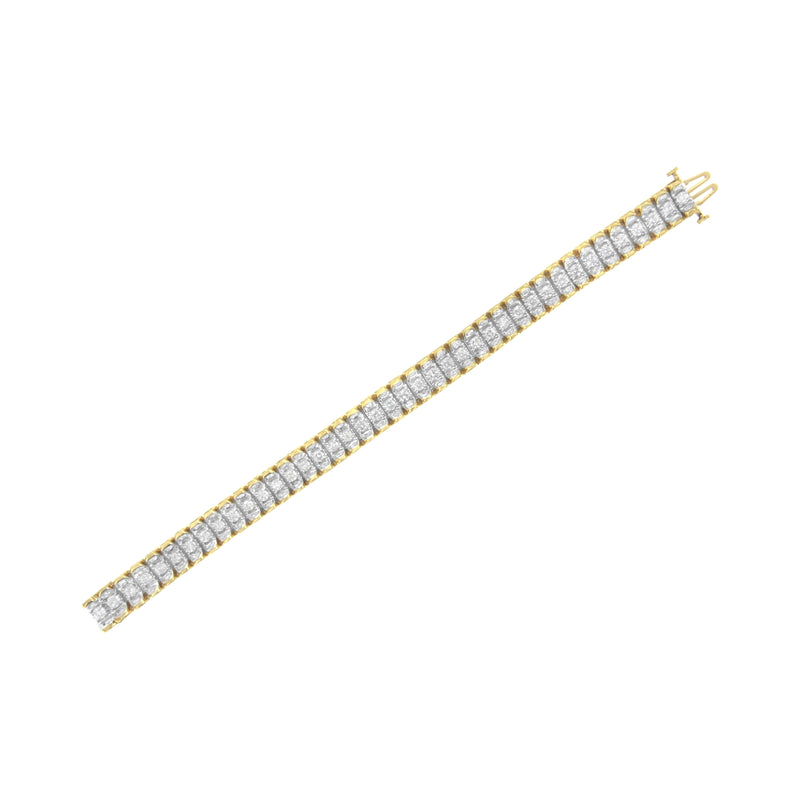 Bids.com 14K Yellow and White Gold 5.0 Cttw Round & Baguette Cut Diamond 7" Reflective Tennis Bracelet (H-I Color, I1-I2 Clarity) Bracelets