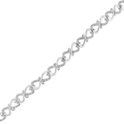 Bids.com .925 Sterling Silver 1/3 Cttw Round-Cut Diamond Double Heart Infinity Link 7.25" Bracelet (H-I Color, I3 Clarity) Bracelets