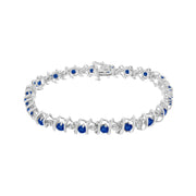 Bids.com .925 Sterling Silver, Lab-Grown Gemstone and 4 Cttw Round Diamond Tennis Bracelet (H-I Color, I1-I2 Clarity) - Created Blue Sapphire, September Birthstone Bracelets