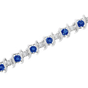 Bids.com .925 Sterling Silver, Lab-Grown Gemstone and 4 Cttw Round Diamond Tennis Bracelet (H-I Color, I1-I2 Clarity) - Created Blue Sapphire, September Birthstone Bracelets