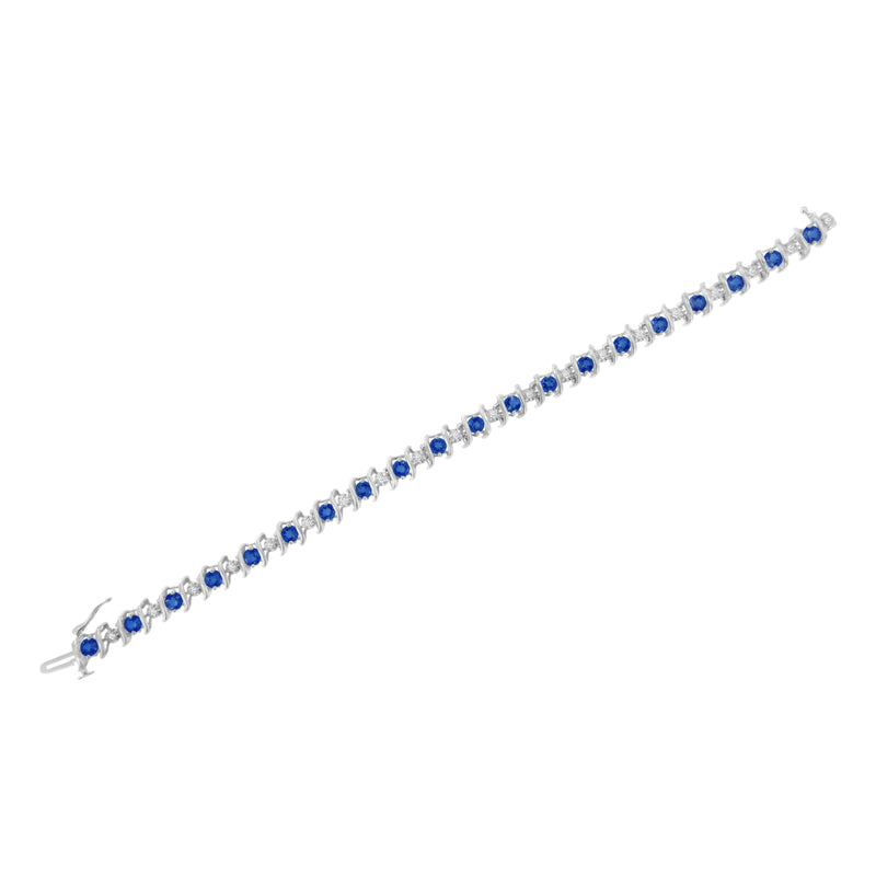 Bids.com .925 Sterling Silver, Lab-Grown Gemstone and 4 Cttw Round Diamond Tennis Bracelet (H-I Color, I1-I2 Clarity) - Created Blue Sapphire, September Birthstone Bracelets