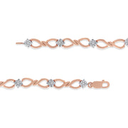 Bids.com 10K Rose Gold 1/2 cttw Diamond Cluster and Infinity Weave Link Bracelet (H-I Color, I2-I3 Clarity) - Size 7" Bracelets