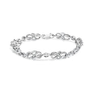Bids.com .925 Sterling Silver 1.0 Cttw Diamond Infinity Loop and Swirl Link Bracelet (I-J Color, I2-I3 Clarity) - 7.25" Inches Bracelets