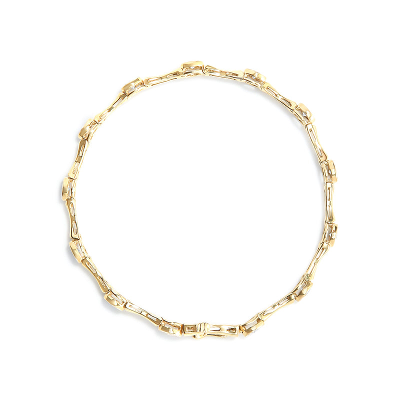 Bids.com 10K Yellow Gold Plated .925 Sterling Silver 1.0 Cttw Miracle Set Diamond Bezel Style Station Link Bracelet (H-I Color, I3 Clarity) - Size 7" Bracelets