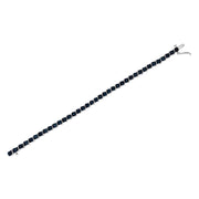 Bids.com .925 Sterling Silver 1/10 Cttw Miracle-Set Treated Blue Color Diamond Miracle Plate "S" Link Tennis Bracelet (Blue Color, I2- I3 Clarity) - 7.25" Bracelets