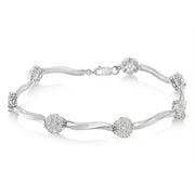 Bids.com .925 Sterling Silver 1.0 cttw Miracle-Set Diamond 7 Stone Floral Cluster Link Bracelet (I-J Color, I3 Clarity) -7" Bracelets