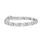 Bids.com .925 Sterling Silver 1.0 Cttw Round-Brilliant and Baguette Cut Diamond Miracle-Set X-Link 7" Tennis Bracelet (I-J Color, I2-I3 Clarity) Bracelets