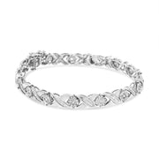 Bids.com .925 Sterling Silver 1.0 Cttw Round-Brilliant and Baguette Cut Diamond Miracle-Set X-Link 7" Tennis Bracelet (I-J Color, I2-I3 Clarity) Bracelets