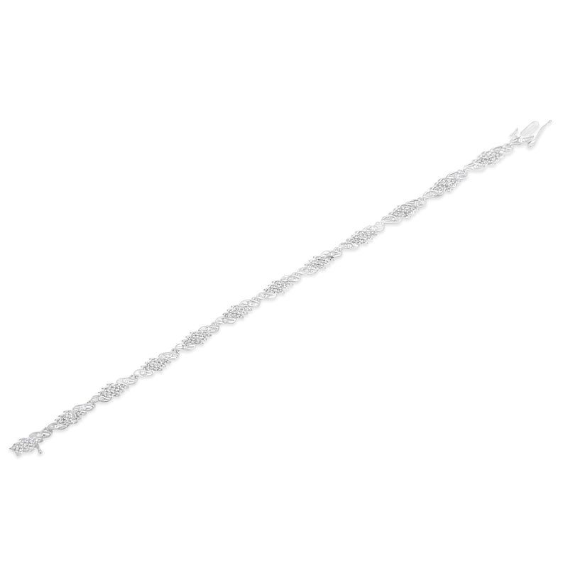 Bids.com .925 Sterling Silver 1-1/2 Cttw Round and Baguette Cut Diamond Wave Link Bracelet (I-J Color, I2-I3 Clarity) - 7" Bracelets
