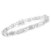 Bids.com .925 Sterling Silver 1.0 Cttw Round-Cut and Baguette-Cut Diamond X-Link Bracelet (I-J Color, I1-I2 Clarity) - 7" Bracelets