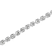 Bids.com .925 Sterling Silver 1/10 cttw Miracle-Set Round-Cut Diamond "X" Link Tennis Bracelet (I-J color, I2-I3 clarity) - 7.25" Bracelets White Smoke White.Sterling Silver / 7.25