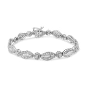 Bids.com .925 Sterling Silver 1 cttw Diamond Double Leaf and Bezel Link Bracelet (I-J Clarity, I2-I3 Color) - Size 7.25" Bracelets