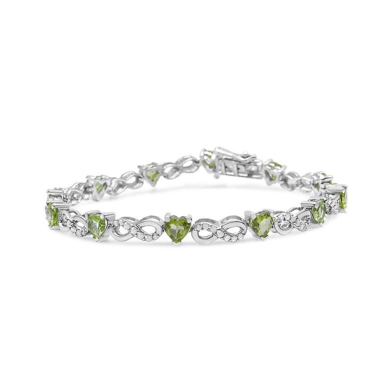 Bids.com .925 Sterling Silver 1.00 Cttw Diamond and 4.00mm Lab Created Green Heart-Shaped Peridot Infinity Link Bracelet (I-J Color, I2-I3 Clarity) - 7.25" Bracelets