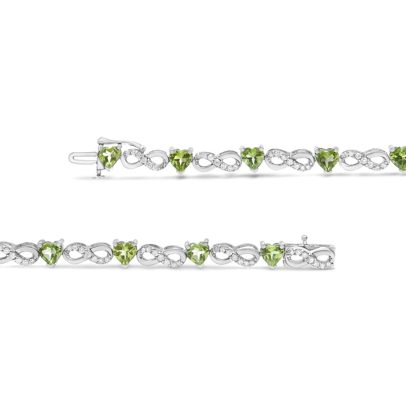 Bids.com .925 Sterling Silver 1.00 Cttw Diamond and 4.00mm Lab Created Green Heart-Shaped Peridot Infinity Link Bracelet (I-J Color, I2-I3 Clarity) - 7.25" Bracelets