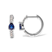 Bids.com 10K White Gold Pear Shaped Blue Sapphire and 1/10 Cttw Diamond Huggy Hoop Earrings (H-I Color, I1-I2 Clarity) Earrings