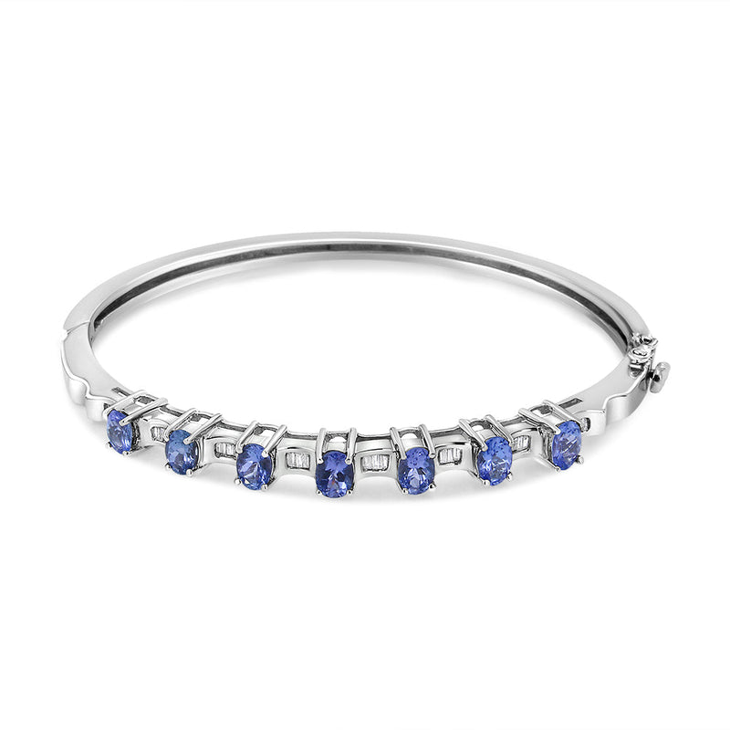 Bids.com 14K White Gold 5 MM Oval Blue Tanzanite and 1/4 Cttw Diamond Bangle (H-I Color, VS2-SI1 Clarity) - Fits wrists up to 7 1/2 Inches Bracelets