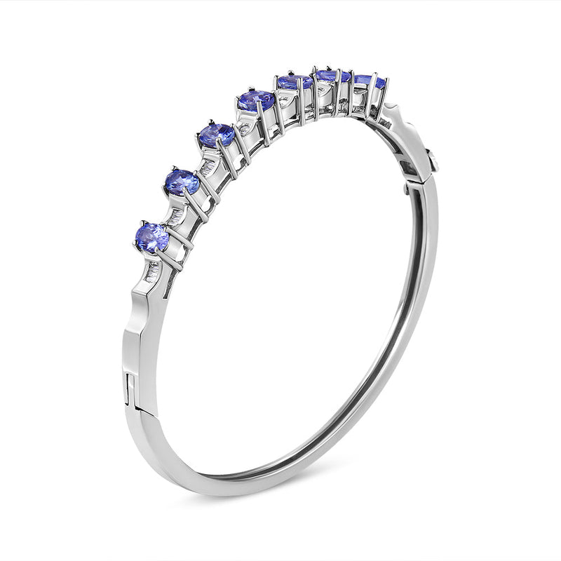 Bids.com 14K White Gold 5 MM Oval Blue Tanzanite and 1/4 Cttw Diamond Bangle (H-I Color, VS2-SI1 Clarity) - Fits wrists up to 7 1/2 Inches Bracelets