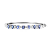 Bids.com 14K White Gold 5 MM Oval Blue Tanzanite and 1/4 Cttw Diamond Bangle (H-I Color, VS2-SI1 Clarity) - Fits wrists up to 7 1/2 Inches Bracelets