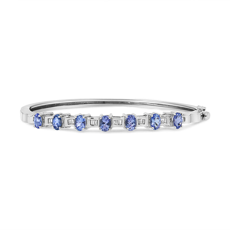 Bids.com 14K White Gold 5 MM Oval Blue Tanzanite and 1/4 Cttw Diamond Bangle (H-I Color, VS2-SI1 Clarity) - Fits wrists up to 7 1/2 Inches Bracelets