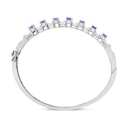 Bids.com 14K White Gold 5 MM Oval Blue Tanzanite and 1/4 Cttw Diamond Bangle (H-I Color, VS2-SI1 Clarity) - Fits wrists up to 7 1/2 Inches Bracelets