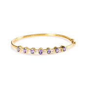 Bids.com 14K Yellow Gold Alternating Bezel Set 5MM Oval Shaped Tanzanite and 1/5 Cttw Diamond Bangle Bracelet (H-I Color, VS2-SI1 Clarity) - Fit's wrists up to 7.25" Inches Bracelets