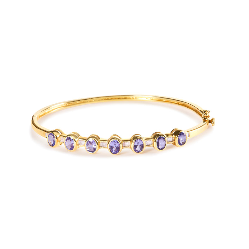 Bids.com 14K Yellow Gold Alternating Bezel Set 5MM Oval Shaped Tanzanite and 1/5 Cttw Diamond Bangle Bracelet (H-I Color, VS2-SI1 Clarity) - Fit's wrists up to 7.25" Inches Bracelets