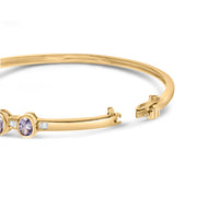 Bids.com 14K Yellow Gold Alternating Bezel Set 5MM Oval Shaped Tanzanite and 1/5 Cttw Diamond Bangle Bracelet (H-I Color, VS2-SI1 Clarity) - Fit's wrists up to 7.25" Inches Bracelets
