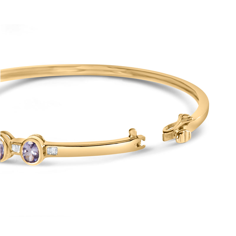 Bids.com 14K Yellow Gold Alternating Bezel Set 5MM Oval Shaped Tanzanite and 1/5 Cttw Diamond Bangle Bracelet (H-I Color, VS2-SI1 Clarity) - Fit's wrists up to 7.25" Inches Bracelets