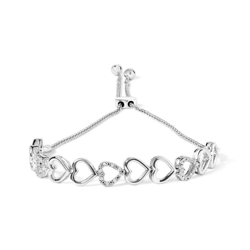 Bids.com .925 Sterling Silver 1/10 Cttw Diamond Heart Link Bolo Bracelet (I-J Color, I2-I3 Clarity) Bracelets