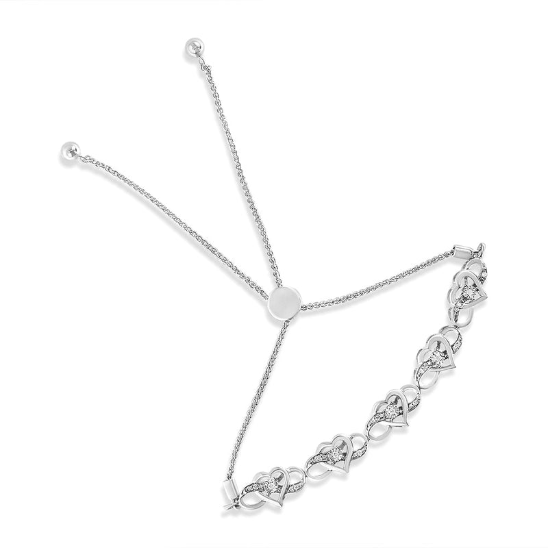 Bids.com .925 Sterling Silver Miracle Set Diamond Accented Infinity Hearts 6â€-9â€ Adjustable Bolo Bracelet (H-I Color, I2-I3 Clarity) Bracelets