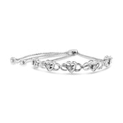 Bids.com .925 Sterling Silver Miracle Set Diamond Accented Infinity Hearts 6â€-9â€ Adjustable Bolo Bracelet (H-I Color, I2-I3 Clarity) Bracelets