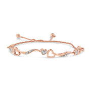 Bids.com 14K Rose Gold Plated .925 Sterling Silver 1/10 Cttw Diamond Wave and Hearts 4â€-10â€ Adjustable Bolo Bracelet (I-J Color, I3 Clarity) Bracelets