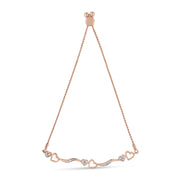 Bids.com 14K Rose Gold Plated .925 Sterling Silver 1/10 Cttw Diamond Wave and Hearts 4â€-10â€ Adjustable Bolo Bracelet (I-J Color, I3 Clarity) Bracelets