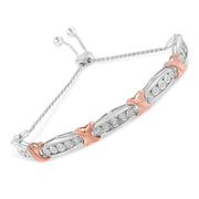 Bids.com .925 Sterling Silver 1/4 Cttw Round-Cut Diamond X & Tapered Bar Miracle-Set Bolo Bracelet (I-J Color, I3 Clarity) - Two Tone Rose Gold & Silver Bracelets