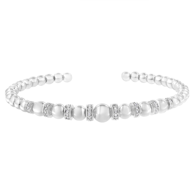 Bids.com .925 Sterling Silver 1/4 Cttw Diamond Rondelle Graduated Ball Bead Cuff Bangle Bracelet (I-J color, I2-I3 clarity) - Fits wrists up to 7 1/2 inches Bracelets