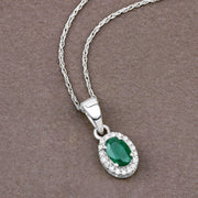 Bids.com 0.81 Carat Genuine Zambian Emerald and White Diamond 14K White Gold Pendant Pendants