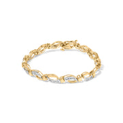 Bids.com 10K Yellow and White Gold 1/2 Cttw Channel Set Diamond Infinity Link 7" Tennis Bracelet (H-I Color, I1-I2 Clarity) Bracelets