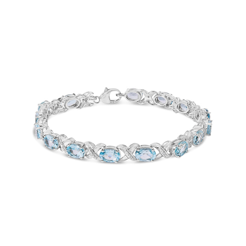 Bids.com .925 Sterling Silver 16.0 Cttw Oval Blue Topaz and Diamond Accent Tennis X Link Bracelet (I-J Color, I1-I2 Clarity) - Size 7" Inch Bracelets