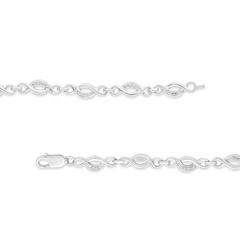 Bids.com .925 Sterling Silver Prong Set Diamond Accent Curved Spiral Link Bracelet (I-J Color, I3 Clarity) - 7.25" Bracelets
