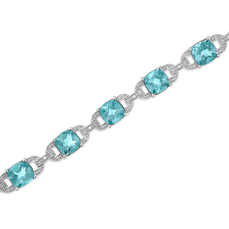 Bids.com .925 Sterling Silver 7x7 mm Cushion Cut Blue Topaz and 1/20 cttw Round Cut Diamond Fashion Tennis Bracelet (I-J Color, I1-I2 Clarity) - 7" Bracelets