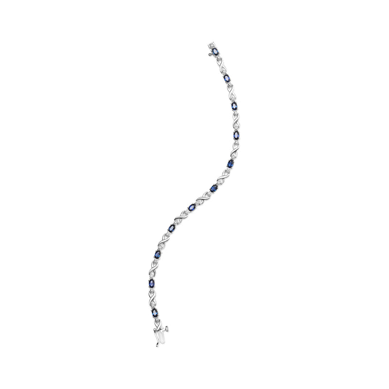 Bids.com 10K White Gold 5x4mm Oval Sapphire Gemstone and 1/10 Cttw Diamond Prong Set "X" Link Bracelet - Size 7" (H-I Color, SI1-SI2 Clarity) Bracelets