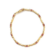 Bids.com 10K Yellow Gold Oval Ruby and 1/10 Cttw Diamond Bar Prong Set Bracelet (H-I Color, SI1-SI2 Clarity)  - Size 7" Bracelets