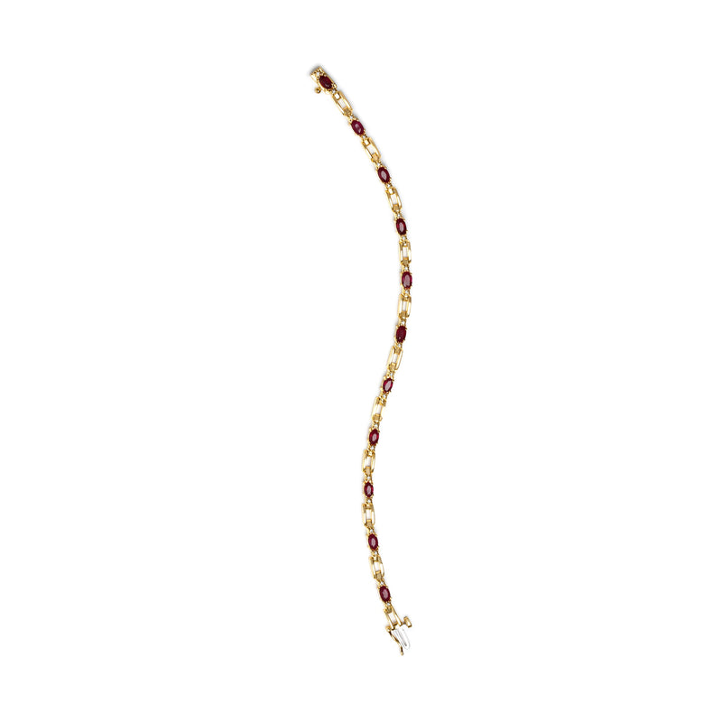 Bids.com 10K Yellow Gold Oval Ruby and 1/10 Cttw Diamond Bar Prong Set Bracelet (H-I Color, SI1-SI2 Clarity)  - Size 7" Bracelets