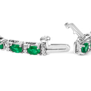 Bids.com 14K White Gold Alternating Oval Green Emerald and Diamond Tennis Bracelet Bracelets